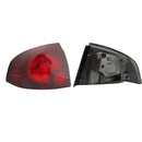 CALAVERA IZQ S/ARNES OSCURA (HUMO/ROJO) SENTRA B-15 2004 -2006